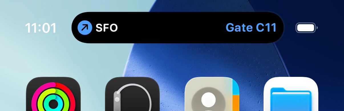 Flyte Live Activity running in the compact iOS 26 Dynamic Island, showing SFO and Gate C11